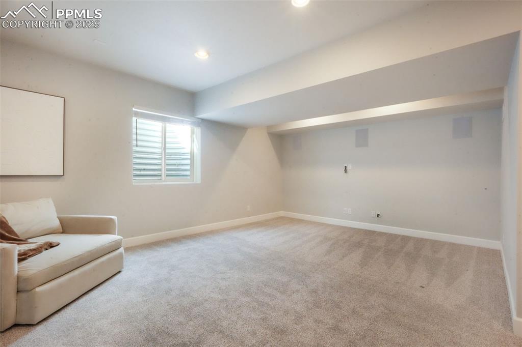 Image 45 of 50: Unfurnished room featuring light carpet and recessed lighting