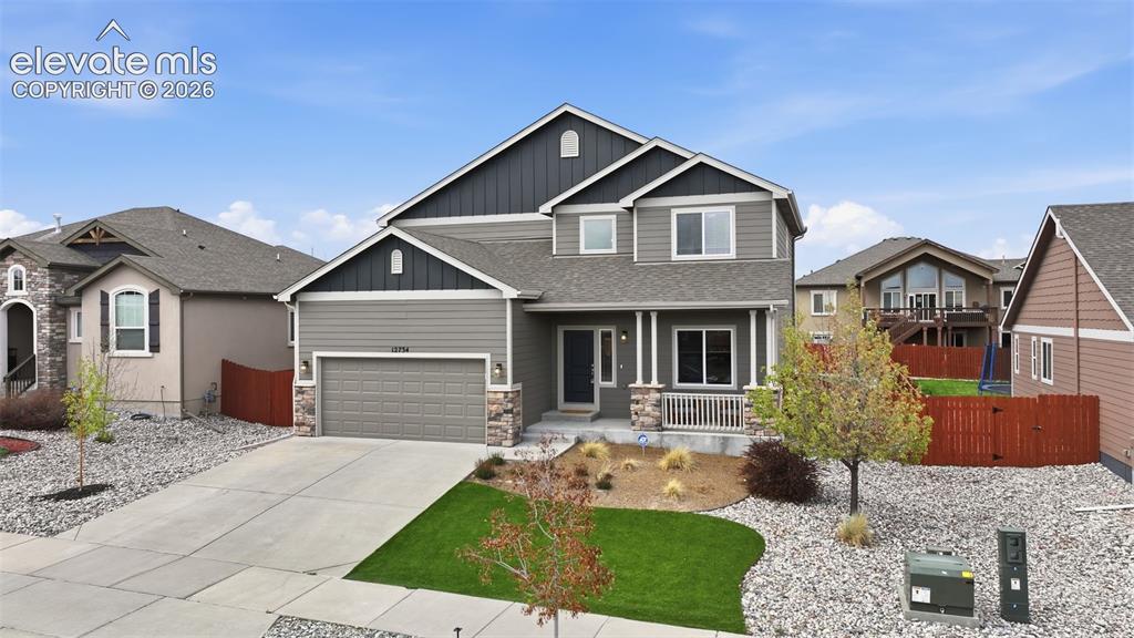 Image 1 of 37: Fantastic curb appeal! Enjoy the covered front porch, low-maintenance, xeri