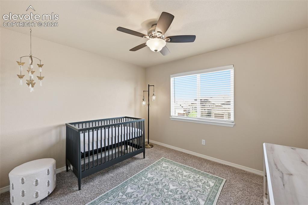 Image 15 of 37: Primary suite w/ vaulted ceilings & attached 5-piece bath & large walk-in c