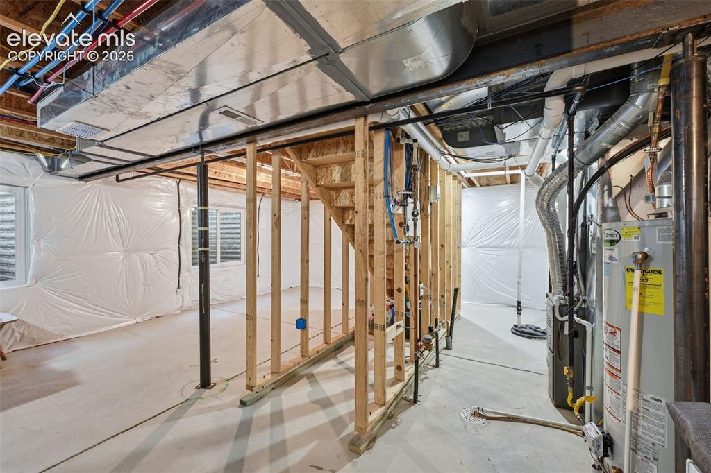 Image 24 of 37: Full bathroom on second floor with tub/shower combo & generous counter spac