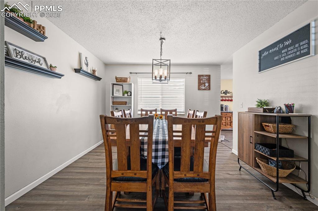 Image 5 of 30: Inviting dining area filled with natural light, featuring neutral tones and
