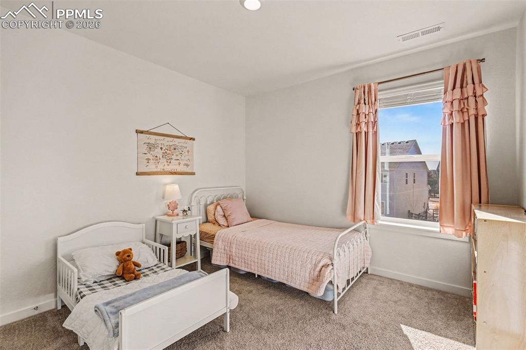 Image 13 of 22: Spacious secondary bedrooms