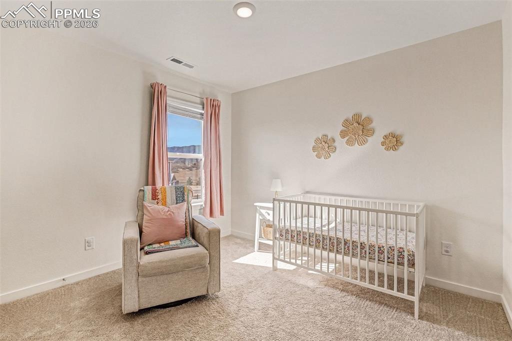 Image 15 of 22: Spacious secondary bedrooms