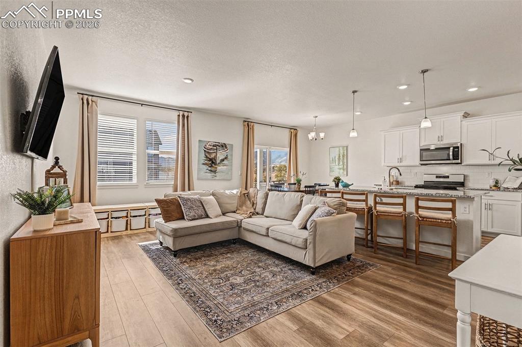 Image 2 of 22: LVP throughout main.