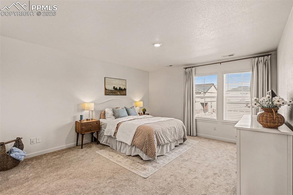 Image 9 of 22: Spacious master bedroom