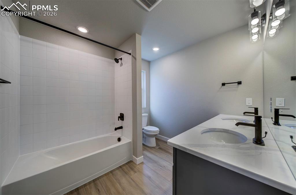 Image 30 of 32: **Pictures are from a previously completed home, not from listed home