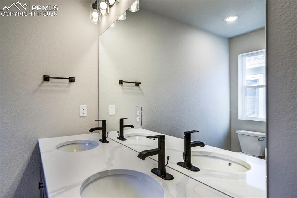 Image 31 of 32: **Pictures are from a previously completed home, not from listed home