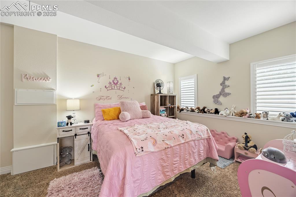 Image 17 of 40: Bedroom featuring carpet floors