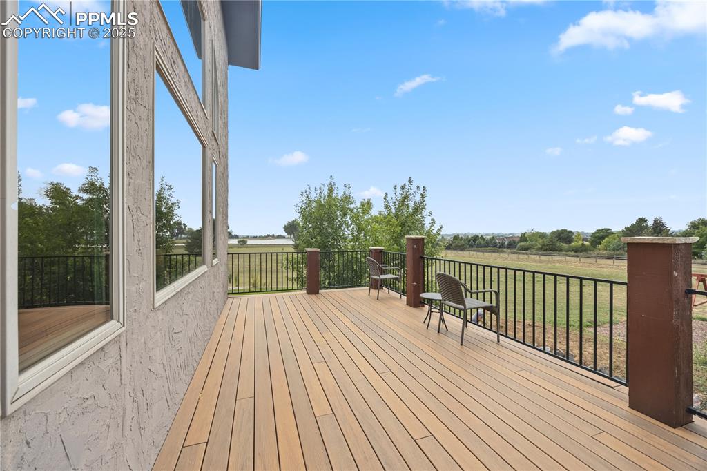Image 35 of 40: Wooden deck featuring a rural view
