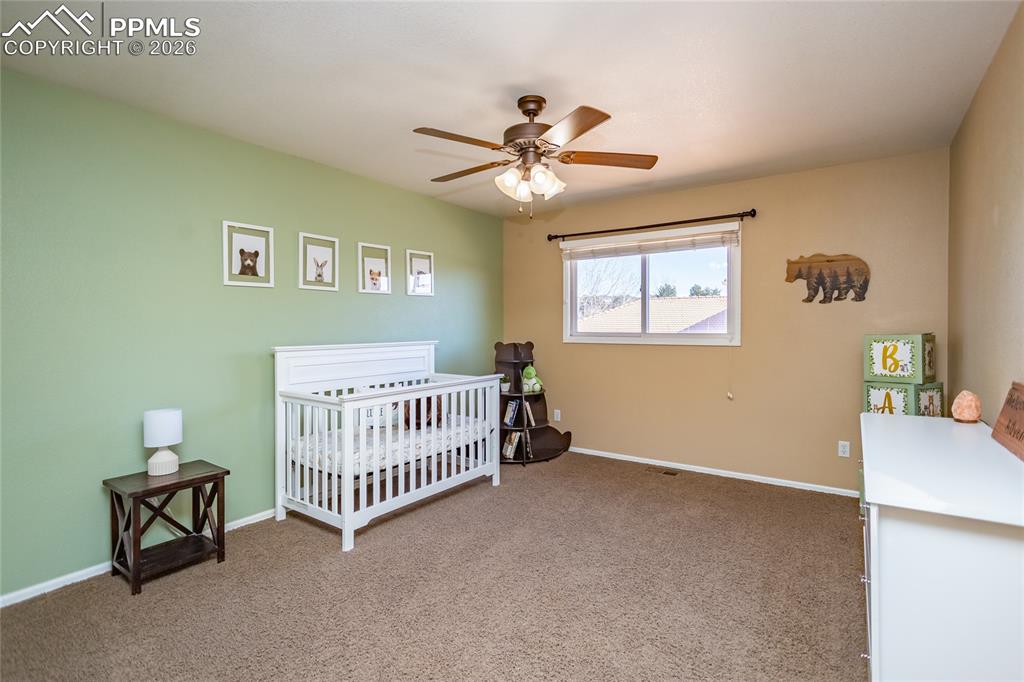 Image 30 of 49: Upper bedroom