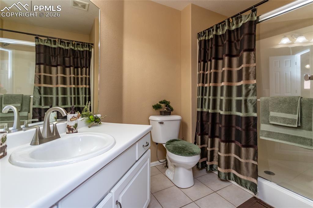 Image 32 of 49: Upper bedroom attached bath