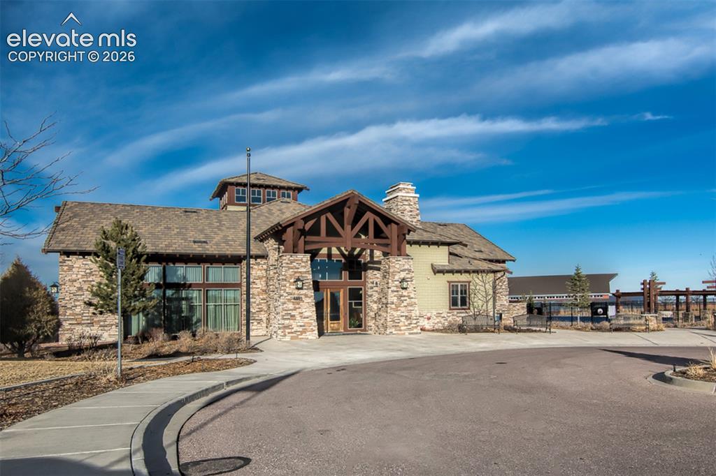 Image 35 of 41: Clubhouse with fitness center, community gather areas and pool access