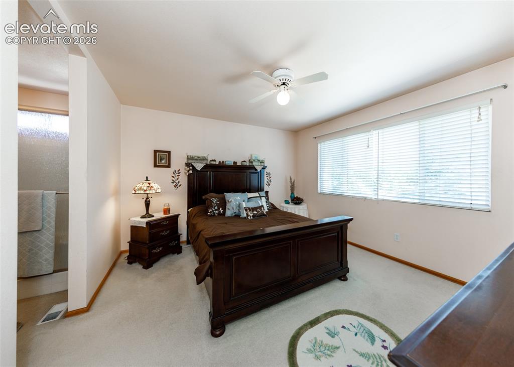 Image 18 of 26: Master Bedroom