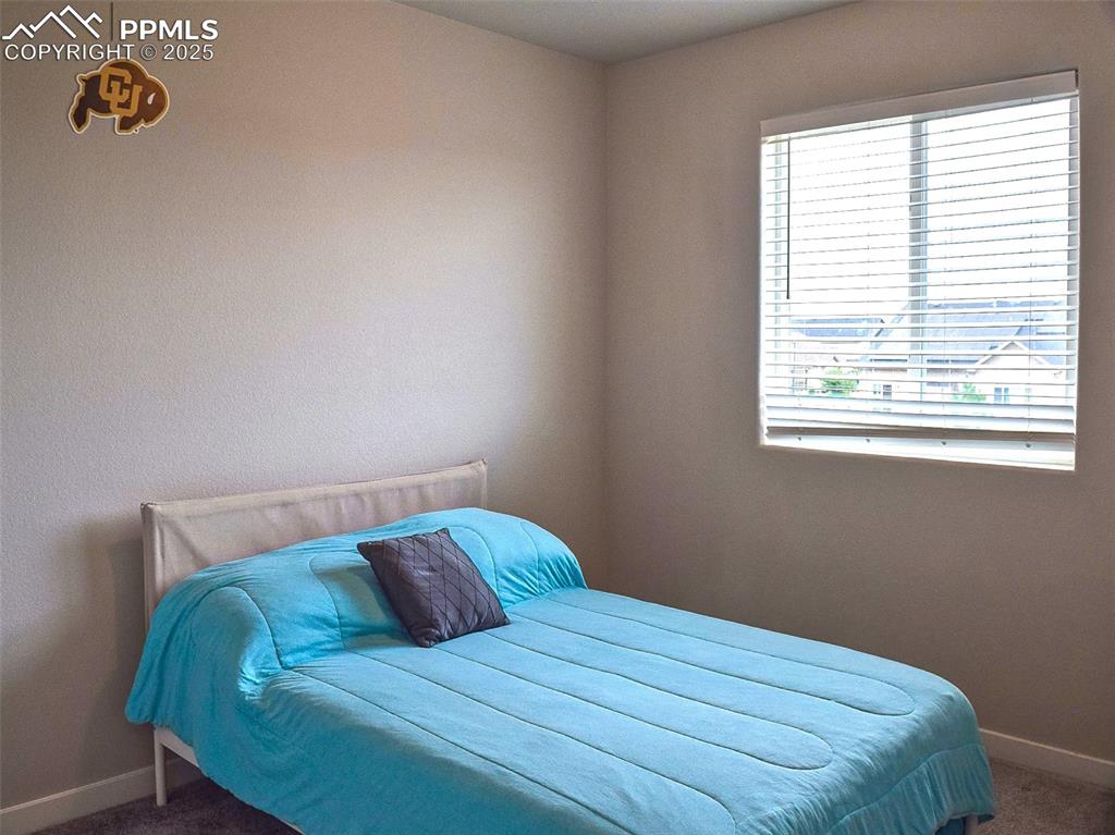 Image 19 of 38: Bedroom