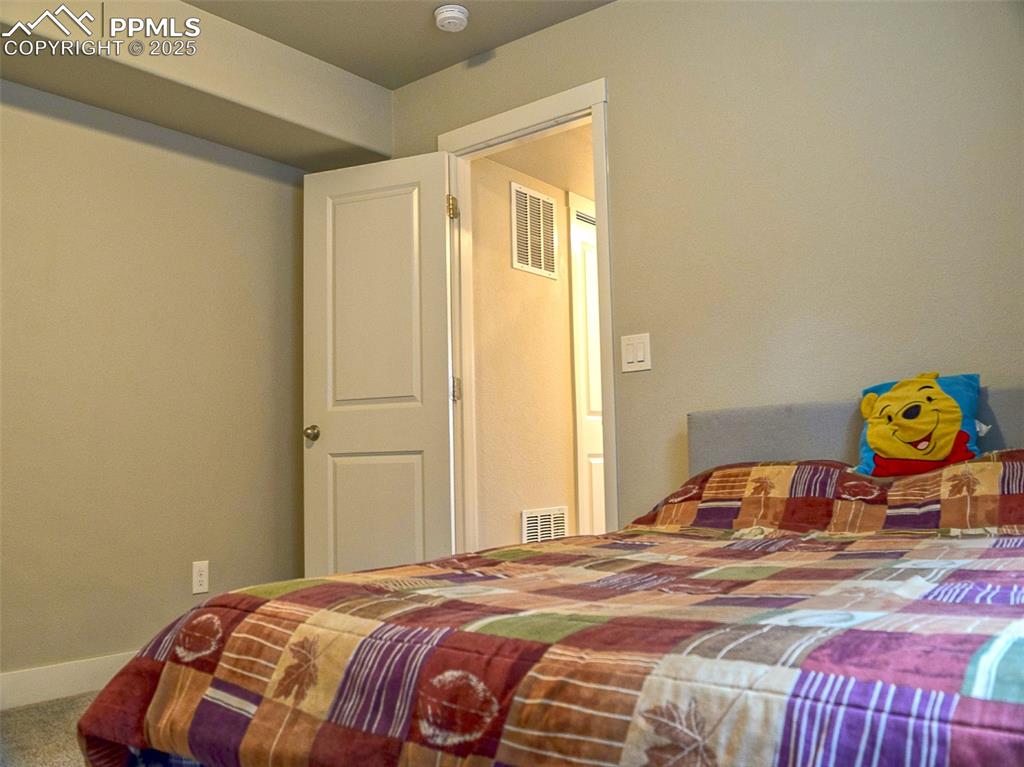 Image 25 of 38: Bedroom