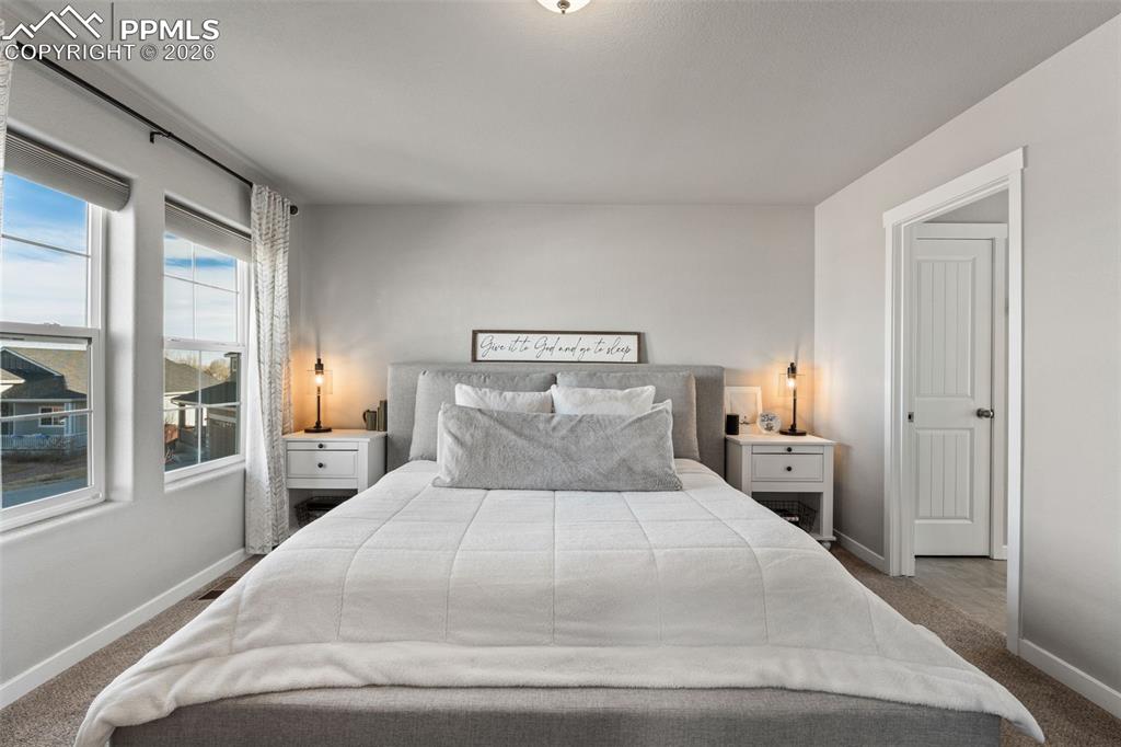 Image 15 of 42: Primary Bedroom on upper level with 5 piece en suite attached 