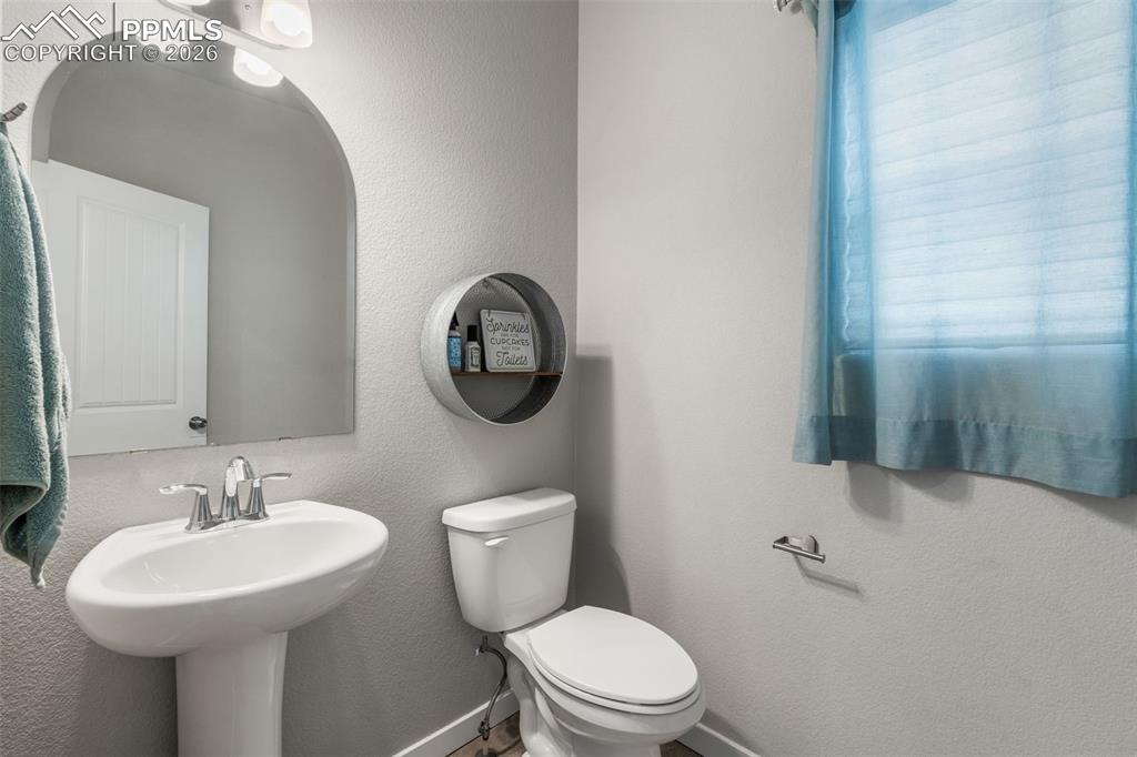 Image 21 of 42: Powder Room On Main Level 