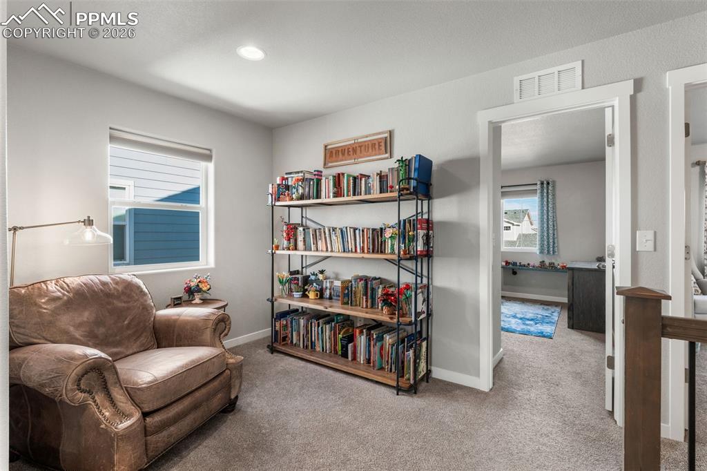 Image 22 of 42: Loft area on upper level 