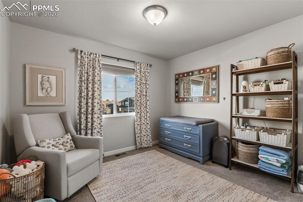 Image 23 of 42: Loft area on upper level