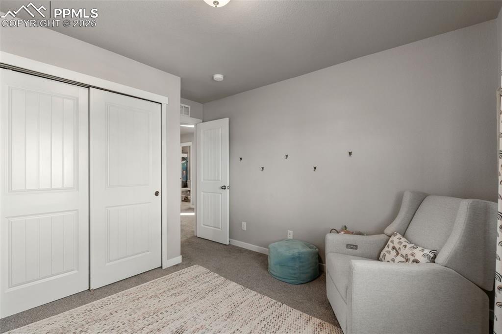 Image 24 of 42: Additional bedroom on upper level 