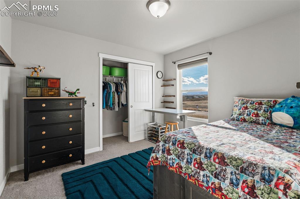 Image 27 of 42: Additional bedroom on upper level 