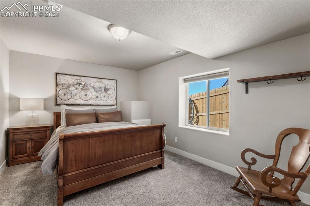 Image 33 of 42: Basement Level Bedroom 