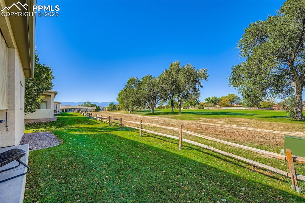 Image 11 of 11: View of yard with a mountain view