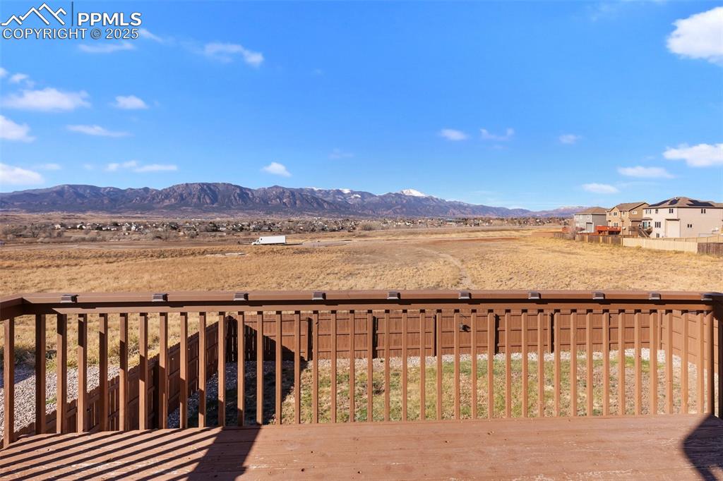 Image 18 of 42: Wooden terrace with a mountain view
