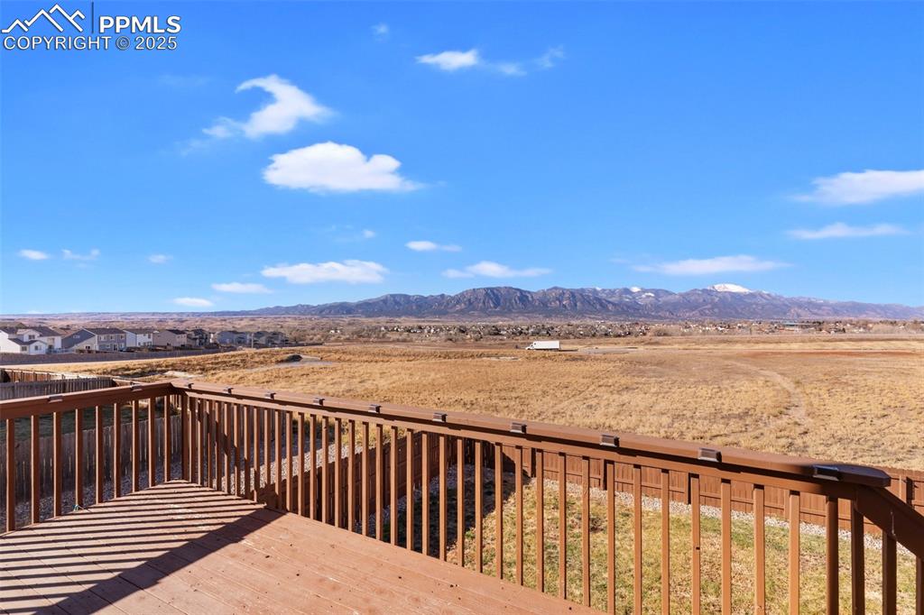 Image 2 of 42: Wooden terrace with a mountain view