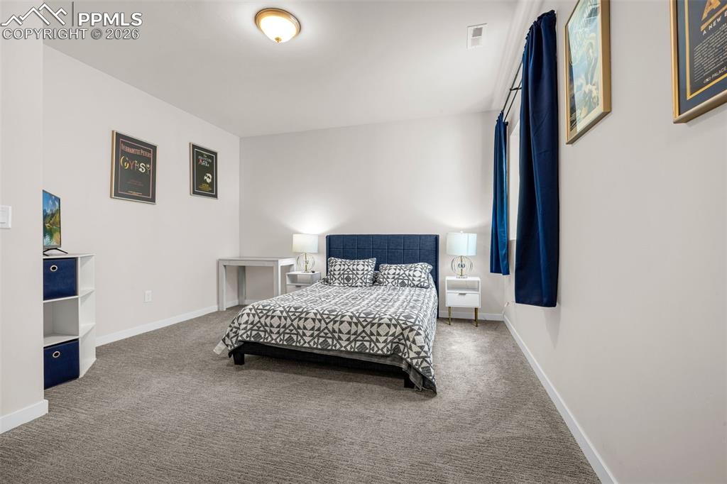 Image 26 of 31: Basement Bedroom