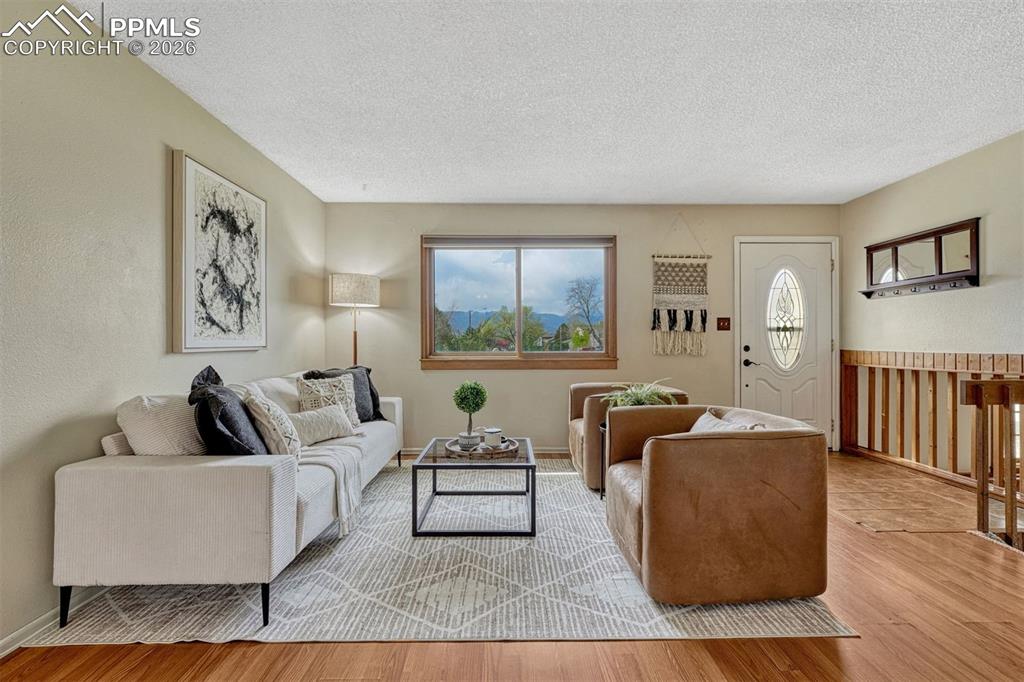 Image 2 of 33: Beautiful wood floors and mountain views