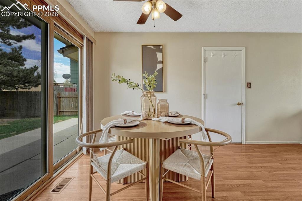 Image 3 of 33: Dining expands to your large outdoor patio