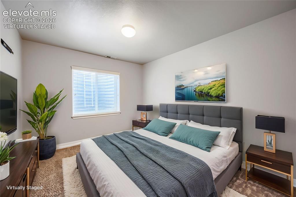 Image 30 of 40: Virtually Staged Basement Bedroom