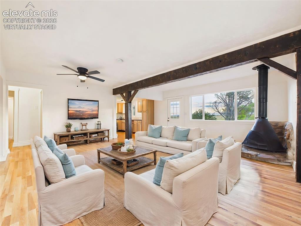Image 11 of 50: (Virtually Staged) Living Room – Another view of the inviting living space