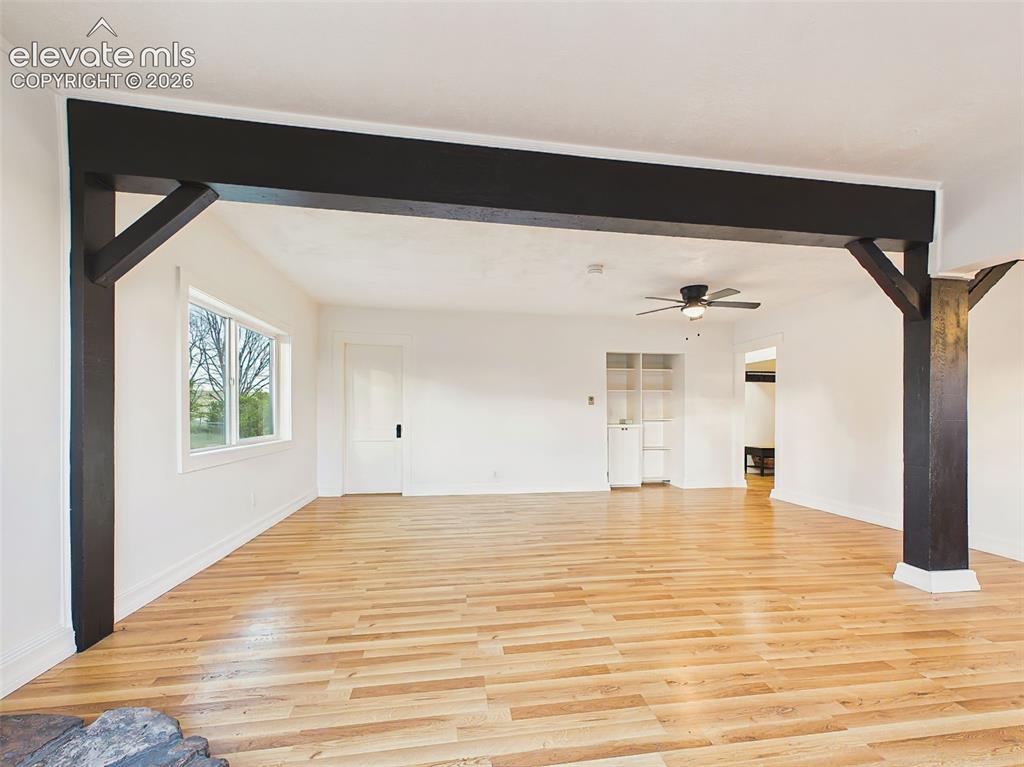Image 14 of 50: Great Room – Flexible living area offers plenty of room for multiple seatin