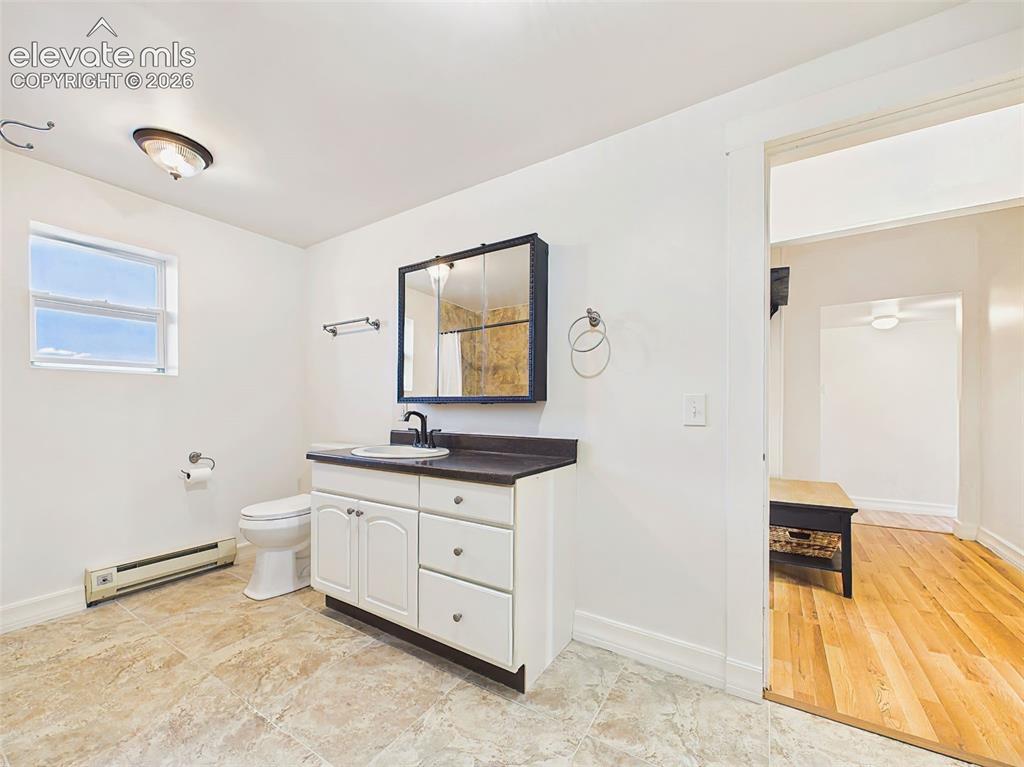 Image 34 of 50: Bathroom – Spacious bathroom includes a large vanity with generous counter