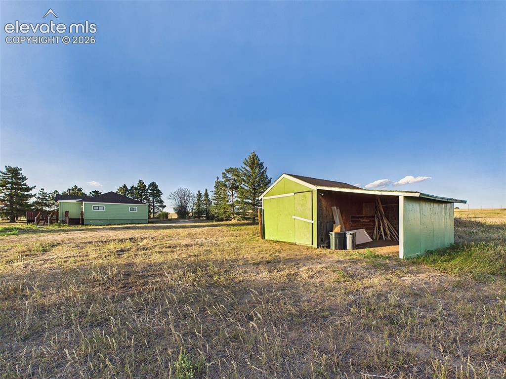 Image 43 of 50: Outbuilding – Additional outbuilding provides convenient space for storage,