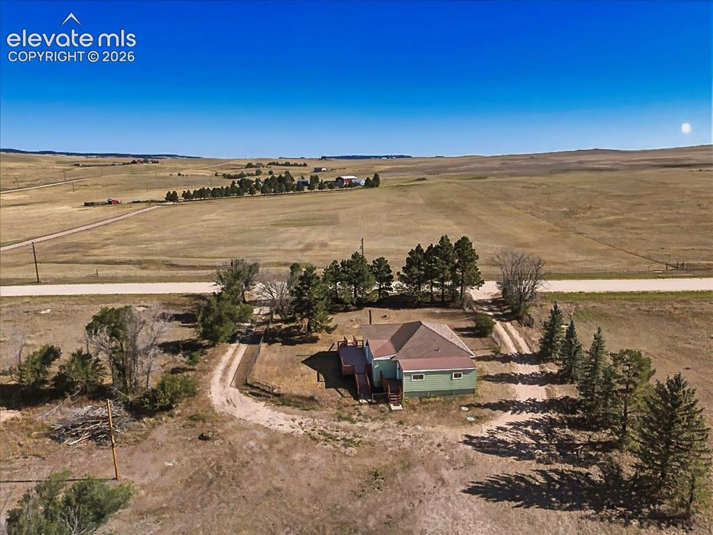 Image 46 of 50: Aerial View – Elevated aerial perspective highlights the home