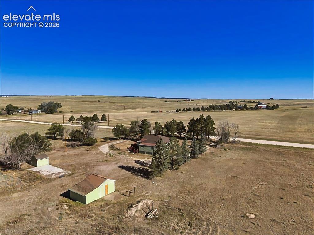 Image 49 of 50: Sweeping aerial perspective showcases the property