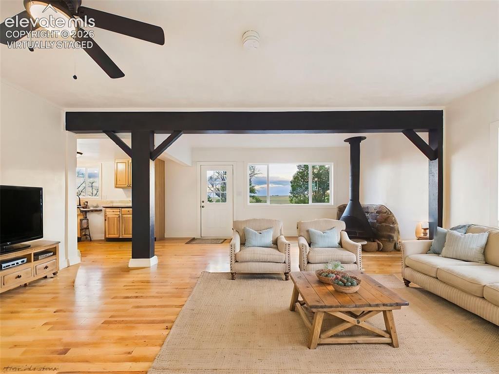 Image 9 of 50: (Virtually Staged) Living Room – Bright and inviting living area offers an