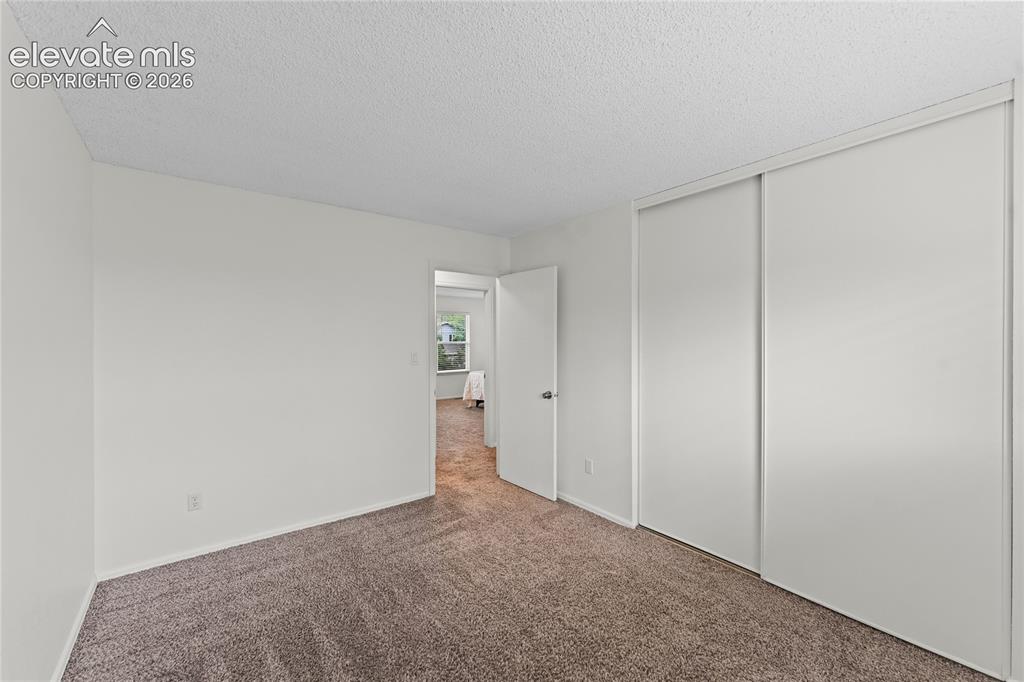 Image 16 of 33: Bedroom