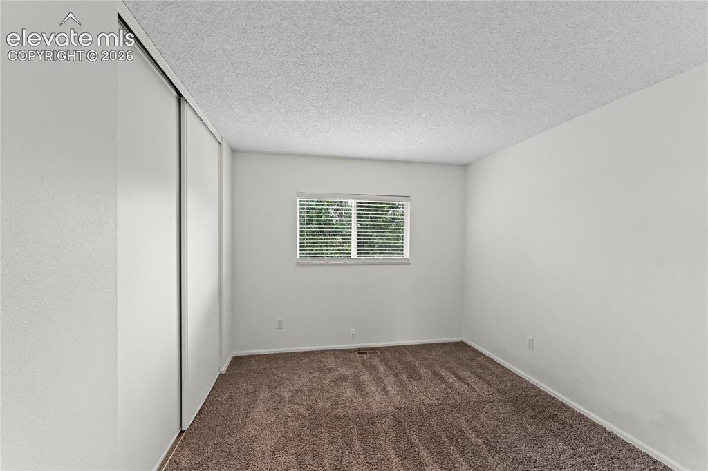Image 18 of 33: Bedroom