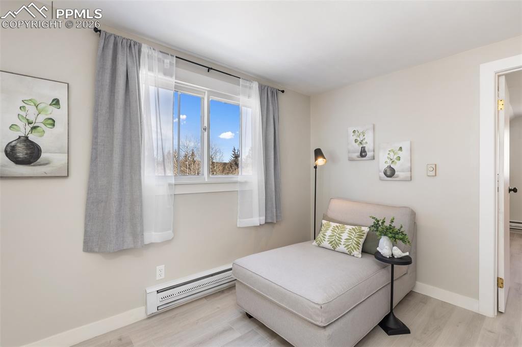 Image 22 of 47: Sitting area adjacent the owners suite