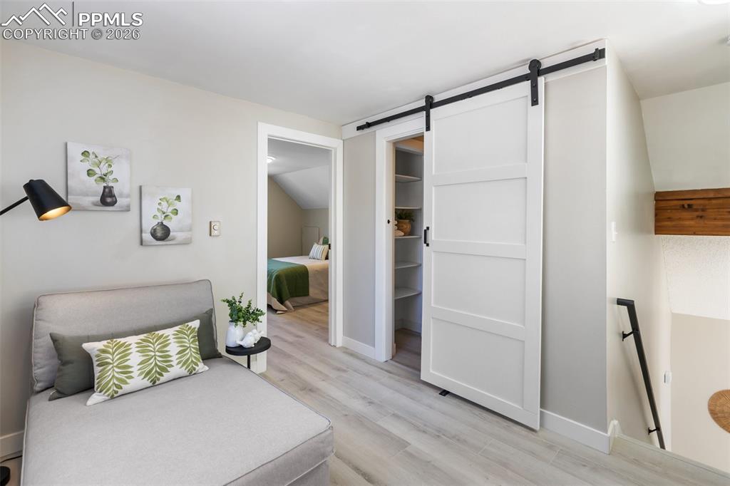 Image 23 of 47: Lofted seating area with 3/4 bath adjacent, and owners suite attached