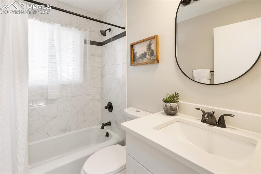 Image 36 of 47: Main level bathroom