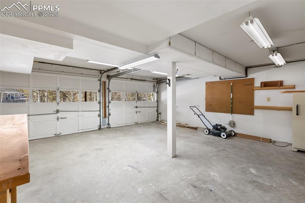 Image 42 of 47: 2 car oversized garage with storage