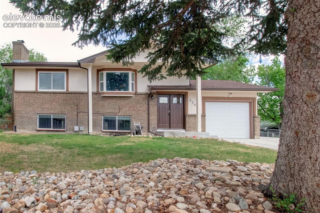 Image 1 of 18: Beautiful Stucco and Brick Exterior