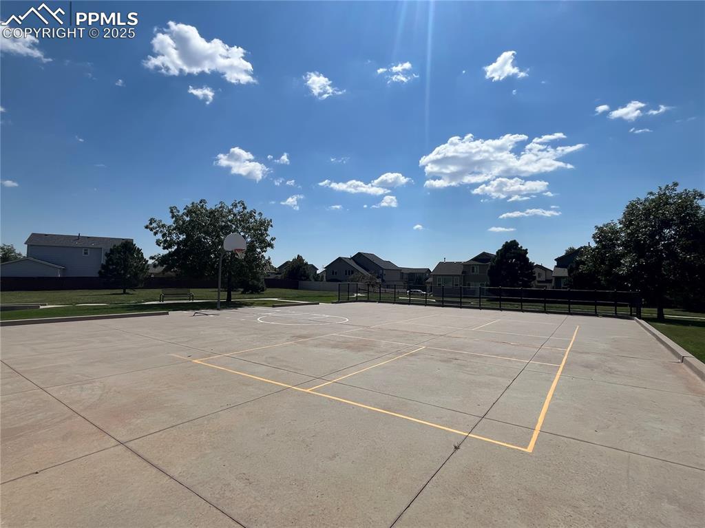Image 27 of 28: Basketball court at community park