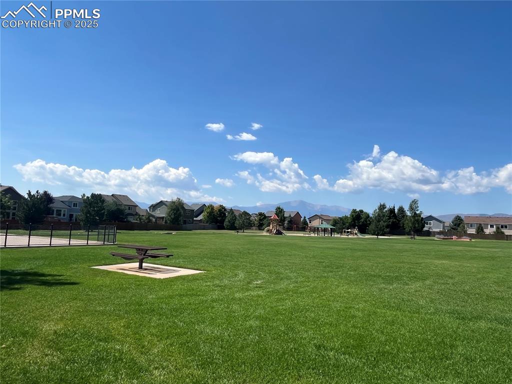 Image 28 of 28: View of community park just 3 houses down featuring a residential view