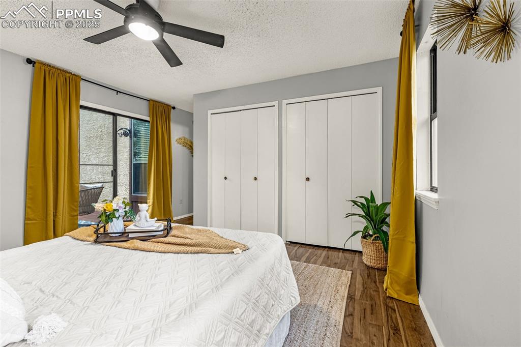 Image 12 of 19: Primary bedroom has walk-out to second private patio and double closets